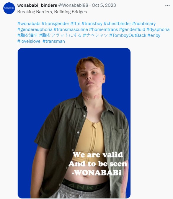A woman with short hair looks sad as she faces the camera wearing a breast binder. The text beneath says "We are valid And to be seen -wonababi"