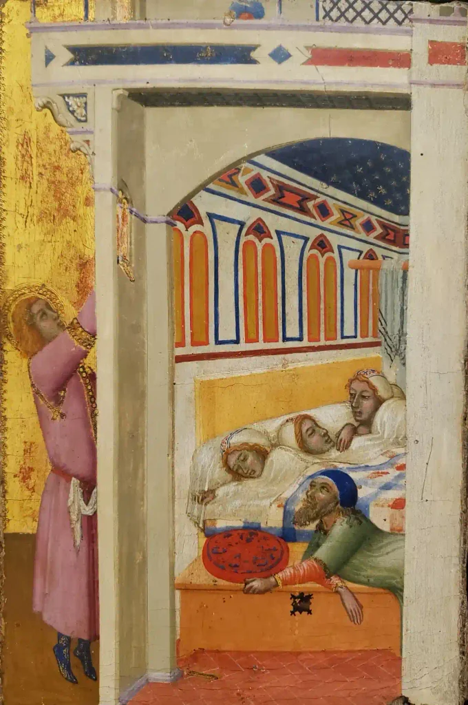 a medieval/early Renaissance gold-ground altarpiece panel depicting an interior scene through an archway — several figures lie sleeping in a canopied bed (one, a bearded man in a blue cap, appears awake and looking outward) while a golden-haired, haloed saint in pink robes stands in a doorway to the left, gesturing or reaching upward. Decorative Gothic architectural painting and a starry blue ceiling panel frame the scene.